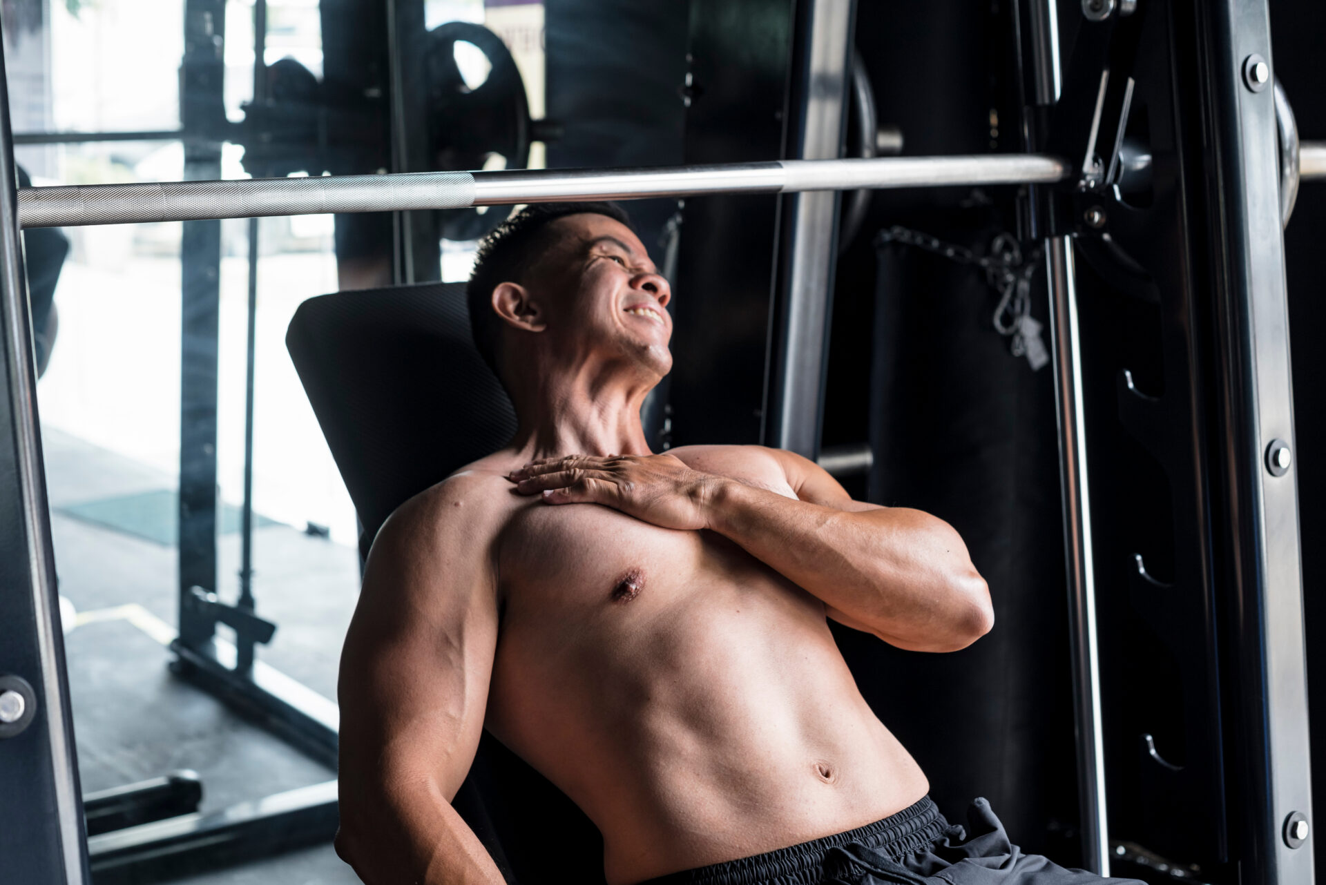 An,Asian,Male,Suffers,A,Torn,Pectoral,Muscle,While,Doing Shoulder Pain